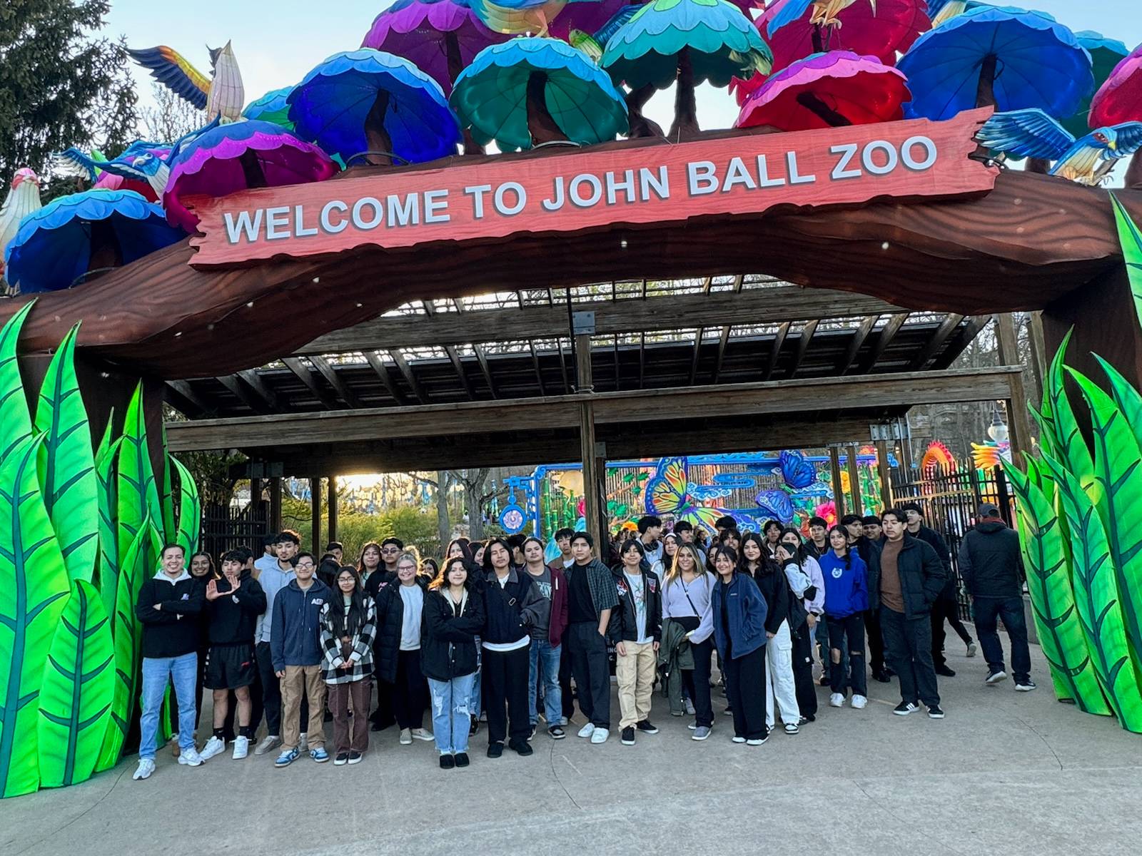 students gathered in front of the John Ball Zoo